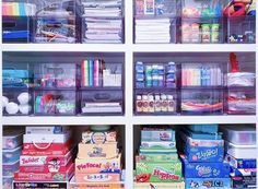 the shelves are filled with many different types of toys and supplies in plastic bins