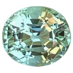 an aqua green diamond on a white background