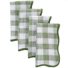 three green and white checkered kitchen towels