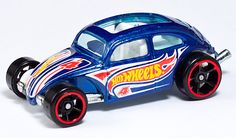 a blue toy car with flames on it's body and wheels, in front of a white background