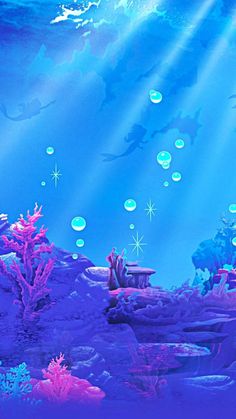 an underwater scene with blue water and corals