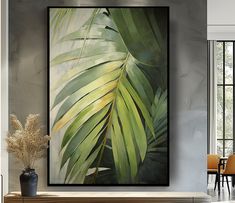 a large painting hanging on the wall in a living room