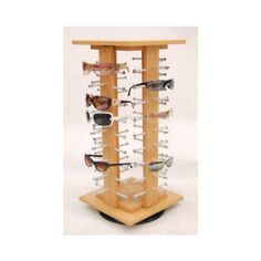 a wooden display case with sunglasses on it