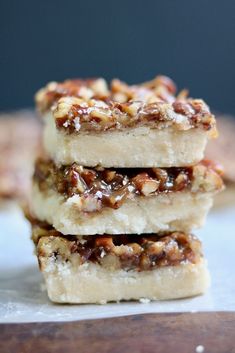 salted caramel and pecan vegan shortbreads stacked on top of each other