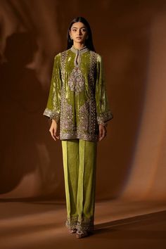 Velvet pant suit,olive green blazer set, wedding pant suit, winter velvet dress,plus size wedding pant suit, velvet Jacket, full sleeves velvet dress. This elegant olive green velvet pant suit has beautiful gota, zari, beads and sequin hand work all over the front, back and sleeves,it has matching raw silk pant with embroidery over the bottom. This elegant design can be wear in any party, wedding and formal functions. ✨We stitched outfit with lot of care, so that our customers should not have an Wedding Pant Suit, Velvet Pant Suit, Velvet Dress Plus Size, Velvet Suit Design, Velvet Pant, Olive Green Blazer, Olive Green Velvet, Sleeved Velvet Dress, Silk Pant