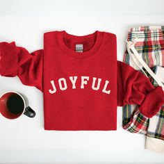 Spread holiday cheer with this cozy and joyful Christmas sweatshirt! Featuring a simple yet impactful "Joyful" design, this sweatshirt is perfect for embracing the holiday spirit. Whether you're sipping hot cocoa by the fire, caroling with friends, or attending a holiday party, this comfy crewneck will keep you warm and stylish all season long. Features: Soft and comfortable unisex crewneck sweatshirt    High-quality print with vibrant colors Available in a variety of sizes and colors (see size chart in images) Makes a perfect gift for friends, family, or yourself! Care Instructions: Machine wash cold inside out Tumble dry low or hang to dry Do not iron directly on the design Shipping: All orders are processed and shipped within 1-7 business days, depending on current order volume. We reco Joyful Design, Comfy Crewneck, Christian Apparel, Winter Sweatshirt, Christmas Gift Idea, Sweatshirt Christmas, Holiday Sweater, Festive Holiday, Cozy Winter