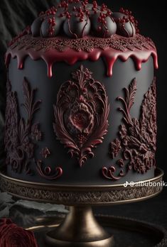 a chocolate cake with red icing and decorations