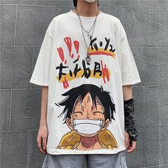 T-shirt One Piece Harajuku overzize de Monkey D. Luffy  - Manches courtes.  - Unisex.  - Lavage en machine conformément aux instructions sur l'étiquette d'entretien.  - Couleur au choix.     Monkey D. Luffy :   Luffy est le capitaine de l’Équipage du Chapeau de Paille, un groupe de pirates qui cherche le trésor légendaire One Piece. Il a mangé le Fruit du Démon du Gumu Gumu no Mi, qui lui donne le pouvoir d White Anime T-shirt With Letter Print, Kawaii T-shirt For Cosplay With Crew Neck, White Anime Print T-shirt For Fans, White Anime T-shirt For Cosplay, Casual Letter Print T-shirt For Cosplay, White Kawaii T-shirt For Streetwear, White Cartoon Print T-shirt For Streetwear, White Harajuku T-shirt With Character Print, White Anime Letter Print T-shirt