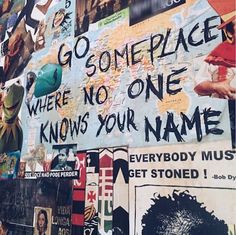 there is a sign on the wall that says go come place where no one knows your name