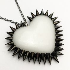 The Double Row Spiked Heart is a Bunny Paige classic. Dozens of spikes are individually hand-applied to give each heart its iconic double row halo. Spiked Heart Pendant: 2.5" wide 16" silver plated or gunmetal chain + 2" extender 100% handmade All jewelry comes beautifully gift wrapped Washing Hands, Spike Necklace, Jewelry Tags, A Bunny, The Double, Cable Chain, Heart Charm, Heart Necklace, Wearable Art