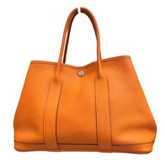 HERMES Garden Party TPM □Okoku Handbag Japan ookura Description Store Item No. 2300039073937 Size(CM) W30cm x H20cmx D13cm Size(Inch) W11.8 x H7.9x D5.1inch 2300034729167 Style Handbag come with None Spec [Inside]interior zip pocket x 1 Condition Rank Total Rank: Used B Condition details There is a corner thread Rubbed at the base of the handle There is some darkening on the handle part There is some deformation, Condition rank N NewBrand new with tags. S New / Unused New item, but may have insignificant scratches or slight discoloration due to storage or display. SA MintUnused or barely used, may have some insignificant scratches or stains. A ExcellentUsed item, may have insignificant scratches and signs of usage. AB Very GoodUsed item, has some insignificant scratches and other signs of Luxury Orange Bags With Large Capacity, Luxury Large Capacity Orange Bags, Luxury Orange Bags With Top Carry Handle, Luxury Orange Handheld Bag, Luxury Handheld Orange Bag, Orange Top Handle Bag With Dust Bag, Luxury Orange Bucket Bag, Orange Top Handle Bags With Leather Handles, Classic Orange Bags With Leather Handles