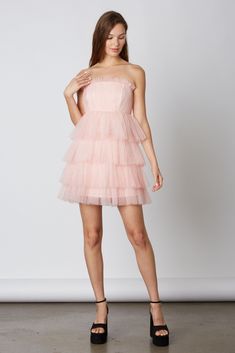 Boasting tiers of fluffy pink tulle, the Travel Together Dress is what fairytales are made of! Go from flower field to ballroom in style - slip on this strapless stunner and prepare for all the compliments you'll be getting! With a back zipper closure for easy wear, you'll be ready to go-go-go! Spring Fitted Tiered Tutu Dress, Pink Ruffled Strapless Dress For Prom, Pink Strapless Ruffle Dress For Prom, Spring Strapless Tulle Dress With Sweetheart Neckline, Spring Wedding Strapless Tiered Dress, Spring Wedding Tiered Tutu Dress, Pink Tiered Strapless Dress For Party, Spring Bridesmaid Tutu Dress, Spring Strapless Tulle Dress For Prom