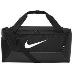 Dump everything you need in the Nike Brasilia Small 9.5 Duffle Bag and get going. Designed with a side compartment that stores belongings separately, this bag helps you stay organized. Its zippered main compartment secures training essentials, while the inner compartment can store dirty and sweaty gear. The coated bottom helps shield your things from bumps, scrapes, and spills, and the outer pockets keep must-haves within reach. Detachable shoulder strap lets you adjust the fit. Dimensions: 20’’ Nike Gym Bag, Nike Duffle Bag, Smelly Shoes, Small Duffle Bag, Soccer Bag, Sport Nike, Nike Bags, Gianfranco Ferre, Training Gear