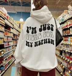 I'm Just Here For My Nephew Hoodie, Funny Aunt Sweatshirt, Future Auntie Shirt, Cool New Aunt Sweater, Birthday Gift From Nephew, N263 🌟 About FastCustomWear 🌟 For those cherished moments when you seek to bring joy to your loved ones with a unique gift, FastCustomWear stands by your side. Our collection features irresistibly soft, exceptionally comfortable t-shirts and exclusive designs, perfect for your special occasions. Should you have any inquiries or feedback regarding our products, feel Auntie And Nephew, Aunt Sweater, Nephew Shirts, Aunt Sweatshirt, Auntie Shirts, New Aunt, Aunt Shirts