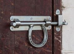 an image of a metal handle on a door