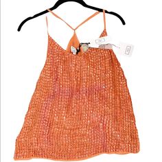 Never Worn With Tags. Mint Condition! No Pilling. No Fraying. No Visible Tears Or Stains! Complementary Coral Orange Color All Sequins In Tact. Adjustable Straps Y Back Viscose Material Fitted Beaded Tops For Spring, Spring Sequined Camisole Top, Sequined Spring Camisole Top, Sequin Spring Camisole Top, Sequin Camisole Top For Spring, Spring Embellished V-neck Tank Top, Spring V-neck Sequin Tank Top, Sequined V-neck Tank Top For Spring, Sequin V-neck Tank Top For Spring