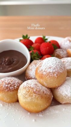 A collection of fluffy mini donuts in various flavors and toppings, including glazed, powdered sugar, chocolate drizzle, and colorful sprinkles. Bite-sized delights for a sweet escape. Donut Bites, Mini Donut Recipes, Strawberry Filled Donuts, Doughnut Recipe Easy, Homemade Donuts Recipe, Chocolate Glazed Donuts, Filled Donuts, Fluffy Texture, Homemade Donuts