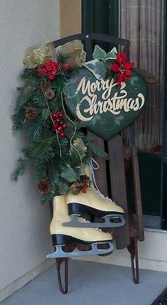 a christmas sign sitting on top of an ice skate