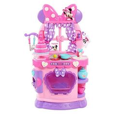 the minnie mouse kitchen playset is pink and purple