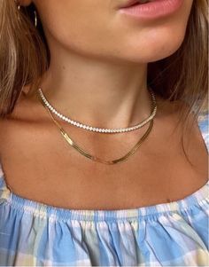 Our luxurious, best selling tennis necklace with a high end feel and finish. 3mm grade A cubic zirconia, diamond cut.  2 micron gold plated. Made to last.  With our monogram tag. Comes in our monogram box. How to take care of your C&Co. items  We advise to store your pieces individually in their box so they don't scratch, rub off or get in a tangle.  Try avoid extreme heat or humidity as this may cause your items to tarnish.  We do recommend when dressing to put your jewellery on after you use p Gold Tennis Necklace With Diamond Accents, Fine Jewelry Gold Tennis Necklace With Diamond Accents, Gold Tennis Necklace With Brilliant Cut For Everyday Luxury, Gold Tennis Necklace With Diamond Accents In Fine Jewelry, Gold Brilliant Cut Tennis Necklace For Everyday Luxury, Minimalist Cubic Zirconia Tennis Necklace As Gift, Everyday Gold Diamond Tennis Necklace, Everyday Luxury Gold Tennis Necklace With Brilliant Cut, Everyday Luxury Cubic Zirconia Diamond Necklace