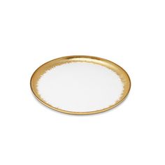 a white and gold plate on a white background