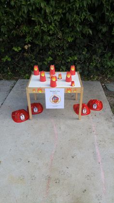 a table with red cones on top of it