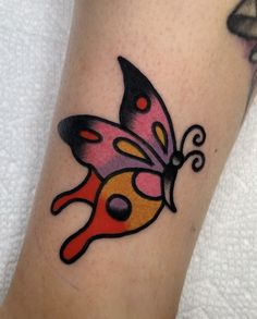 Sakura Butterfly Tattoo, Small Traditional Butterfly Tattoo, Potted Plant Tattoo Traditional, Butterfly American Traditional Tattoo, Pink American Traditional Tattoo, Trad Butterfly Tattoo, American Traditional Tattoos Color, Butterfly Traditional Tattoo, Girly American Traditional Tattoo