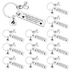 many key chains with different types of tags on them