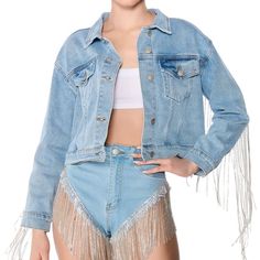 Structured Cotton Washed Denim Fabrication, A Collared Neckline, Button Flap Chest Pockets, A Boxy Cropped Cut, And A Front Button Up Closure. Complete With Rhinestone Link Fringe Along The Back. Casual Long Sleeve Denim Jacket With Rhinestone Fringe, Long Sleeve Denim Jacket With Rhinestone Fringe, Casual Denim Jacket With Rhinestone Fringe, Fitted Denim Jacket With Fringe For Spring, Denim Outerwear With Rhinestone Fringe For Fall, Casual Denim Jacket With Rhinestone Fringe For Fall, Fall Denim Outerwear With Rhinestone Fringe, Trendy Denim Jacket With Rhinestone Fringe For Fall, Trendy Spring Denim Jacket With Rhinestone Fringe