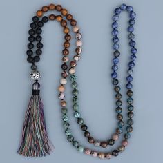 1 pc. Stones: Lava Rock, Phoebe Nanmu Stone, Zebra Stone, African Turquoise, Rhodochrosite, Mosaic Quartz, & Sodalite. Pendant Size: 12cm Pendant Metal: Zinc Alloy Bead Size: 8mm Length: 112cm Natural stone mala necklace unisex yoga meditation long tassels bead necklace Bohemian Necklace With 108 Round Beads, Bohemian Round Beads For Meditation, Bohemian Beaded Necklaces With 8mm Beads For Jewelry Making, Meditation Beaded Amulet Jewelry, Beaded Amulet Jewelry For Meditation, Agate Beaded Bracelets With 108 Beads For Meditation, Spiritual Mala With 8mm Beads, Spiritual Polished Round Bead Jewelry, Spiritual Polished Round Beads Jewelry