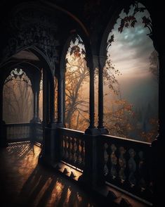 the sun is shining through an open window on a balcony with columns and railings