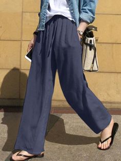 SkuCY-!124231Material>80%Cotton StyleLoose , Plus Size , Wide Leg , High Waisted FeaturePockets , Drawstring , Solid Color OccasionCasual , Simple , Leisure Fashion SeasonsSpring , Summer TypePants , Trousers ColorBLACK,COFFEE,NAVY BLUE,LIGHT BROWNSizeS,M,L,XL,2XL,3XL,4XL,5XL Please consult the size chart we provide for this item's measurements to help you decide which size to buy.Please note: There may be 1-3cm differ due to manual measurement.CMINCHWaistHipsLengthS66109102.5M70114104L74119105.5XL781241072XL82129108.53XL861341104XL90139111.55XL94144113 Navy Trousers Outfit, Cotton Pants Women, Celana Fashion, Navy Trousers, Casual Slacks, Elegant Pant, Solid Color Pants, Loose Trousers, Linen Style