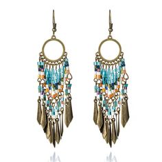 Add a touch of whimsy to your outfit with our Boho Beaded Dream Earrings. Made with colorful beads, these earrings evoke a sense of adventure and freedom. Order now and let your inner dreamer shine! Luxury Boho, Dream Catcher Boho, Ocean Jewelry, Earring Trends, Tassel Drop Earrings, Bleu Turquoise, Beaded Tassels, Fringe Earrings, Bohemian Jewelry