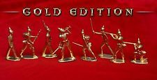 gold figurines are lined up on a red background with the words, gold edition