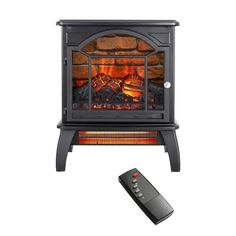 a remote control sitting next to an electric fireplace with logs in the front and side