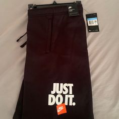 Black Nike Just Do It Shorts In Sizes Small ,Medium, Large & X-Large. Men Nike Black Leisure Shorts, Black Letter Print Shorts For Leisure, Black Short Bottoms With Letter Print, Black Athleisure Bottoms For Leisure, Black Bottoms With Letter Print In Short Length, Black Bottoms With Letter Print, Black Bottoms With Letter Print, Short Length, Black Bottoms With Letter Print Short Length, Black Short Length Bottoms With Letter Print