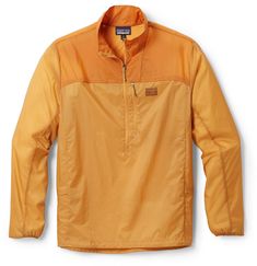 A highly packable shell  the men's Patagonia Houdini Stash Half-Zip jacket offers weather resistance for high-output days when you want a light layer for running in showers or hanging at the summit. Long Sleeve Windbreaker With Ykk Zipper For Hiking, Patagonia Functional Windbreaker For Outdoor, Functional Patagonia Windbreaker For Outdoor, Durable Long Sleeve Windbreaker For Hiking, Patagonia Functional Nylon Windbreaker, Patagonia Nylon Windbreaker For Outdoor, Patagonia Nylon Windbreaker For Hiking, Patagonia Half-zip Outerwear For Outdoor Activities, Midweight Long Sleeve Windbreaker For Outdoor Work