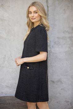 Unleash your playful side with the Kennedy Tweed Dress! The braid detail adds a touch of texture to the solid tweed fabric, while button details on the braided pockets provide a fun twist. Perfect for any occasion with its short sleeves and mini shift design - let the dress do the talking! Details: Zipper Back 70% Polyester 30% Wool Hand wash cold, flat dry Do not iron For best results: Dry Clean Ruffle Neckline Dress, Cross Neck Dress, Brunch Fashion, Tie Sweater, Pleated Mini Dress, Green Style, Tweed Dress, Tweed Fabric, Necklines For Dresses