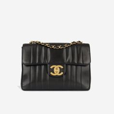 For all the vintage Chanel lovers, this one's for you. This rare Chanel Mademoiselle Flap Bag in XL Jumbo size definitely not easy to find. With its smooth, quilted lambskin leather, gold tone hardware and XL CC logo clasp, this bag is elegant and sophisticated. Ideal for day-to-night usage, you can fit your whole world comfortably inside. Timeless, classic and the ultimate addition to any luxury handbag collection, this vintage gem is a true must-have. SPL Exterior Black quilted lambskin leather Gold plated hardware Enlarged CC turn lock Interwoven leather and chain strap Rear slip pocket 1994/96 production Excellent vintage condition - some exterior scratches as expected with age / corner wear and creasing / some hardware scratching Interior Burgundy leather interior lining Single compar Chanel Mademoiselle, Chanel Lover, Chanel Shoulder Bag, Chanel Model, Black Leather Handbags, Chanel Black, Cc Logo, Chain Shoulder Bag, Vintage Chanel