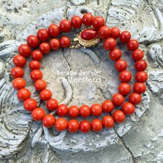 Simple and elegant Sardinia coral bead necklace with an 18k yellow gold clasp! Total Weight: 45.86 grams Necklace Length: 17 inch 18k gold clasp: 18.8mm x 13.7mm Precious Metal: 18k gold Precious stones: -Coral Round Beads: 8.1mm to 9mm diameter -Coral Faceted Oval: 12..3mm x 8.5mm Formal Coral Single Strand Beaded Necklace, Elegant Hand-strung Coral Necklaces, Elegant Coral Hand-strung Necklaces, Elegant Hand-strung Coral Necklace, Formal Single Strand Red Coral Necklace, Elegant Red Coral Necklaces With Polished Beads, Classic Coral Round Jewelry, Classic Round Coral Jewelry, Formal Orange Single Strand Necklace