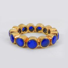 Handmade Blue Cats Eye Gemstone Ring- Gold Plated Brass Ring- Eternity Band Ring- Stackable Ring- Women's Ring- Engagement Ring for Women Description : ~ Material : Brass & Gemstone ~ Gemstone : Synthetic Blue Cat's Eye ~ Gemstone Shape : Round ~ Stone Size : 4 mm Approx ~ Ring Weight : 3.69 Gram Approx ~ Setting Type : Bezel ❣❣ Handmade Item ❣❣ **Made to Order** » G E M S T O N E S D E T A I L S « **Gemstone structure may vary from the image as two gemstones do not have the same structure** Blue Multi-stone Rings For Gift, Cats Eye Ring Design, Cats Eye Stone Ring, Formal Blue Multi-stone Gemstones, Collectible Blue Multi-stone Turquoise Ring, Aventurine Jewelry, Blue Gemstone Ring, Blue Gemstone Rings, Lapis Lazuli Jewelry