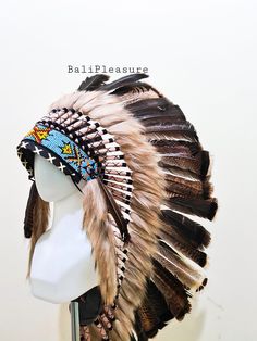 Turkey Feathers Indian Headdress This Headdress is 100% handmade from feathers. * Head circumference: 59 centimeters / 23 inches * Length : Medium * Beads color and pattern may vary each headdress WHY US? * 100% Handmade and Eco Friendly Product * Finest Quality - Each item will go through a Quality Control process before shipping. * No Markup Price * Every purchase supports Balinese Artisans - All Artisans will keep on following their passions while providing for their families. SHIPPING * Esti Bohemian High Crown Hat For Festivals, Carnival Festival Costume Hats With Feathers, Bohemian Costume Hats And Headpieces With Feathers For Festivals, Bohemian Brown Costume Hats And Headpieces For Festivals, Brown High Crown Hat For Festivals, High Crown Brown Costume Hat For Festivals, Festival Costume Hats And Headpieces With Feathers, Festival Feathered Costume Hat, Festival Costume Hat With Feathers