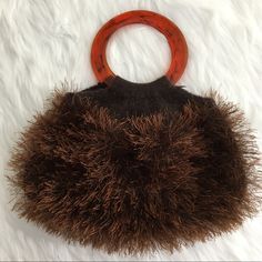 Artisan Made Flexible Handcrafted Brown Felted Wool Slouchy Bag. Has A Double Round Handle. Made Of 100% Wool. Accent Brown Eyelash Yarn Is Nylon/Polyester. To Care For This Bag Hand Wash In Cool Water & Lay Flat To Dry Or Dry Clean. Measurements Flat Are Approximately 9” Tall X 13” Widest Point. Handles Have A 4 1/8” Opening. In Excellent New Condition. Nwt (Box C-22) Handmade Brown Bag With Round Handle, Italian Leather Purse, Felted Bag, Black Bucket Bag, Slouchy Bag, Eyelash Yarn, Round Handle, Black Bucket, Green Purse