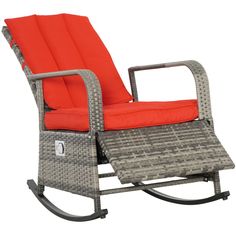 a rocking chair with an orange cushion on it's seat and footrests