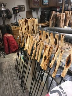 several pieces of wood sitting on top of metal racks