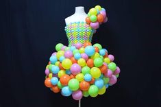 a dress made out of balloons is on display