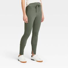 Create an outfit that reflects your chic yet laid-back style with these Drawstring High-Waist Lounge Leggings from A New Day™. Made from a soft and stretchy fabric, these high-waist leggings will keep you comfy from day to night and season to season. The wide waistband with drawstring creates a smooth, flattering silhouette, while the high-waisted design and exposed seams offer you a stylish look. Fashioned in a solid heather cream hue that's easy to mix and match with a variety of tops, you can Target Jumpsuit, Exposed Seams, Versatile Outfits, Closet Ideas, Olive Color, Super Mom, Laid Back Style, Bottom Clothes, Wide Waistband