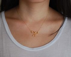 Sweet Bow Gold Necklace also in Silver by jennijewel on Etsy, $23.00 Delicate Bow Jewelry As Gift, Delicate Bow Jewelry For Gifts, Delicate Bow Jewelry For Gift, Gold Jewelry Gift Wrapped For Birthday, Gold Jewelry Birthday Gift Wrapped, Delicate Bow Necklace For Gifts, Gold Dainty Bow Jewelry, Dainty Gold Jewelry With Bow Detail, Gold Jewelry Gift Wrapped For Gift Giving