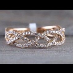 a gold ring with diamonds on it