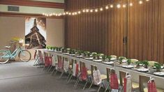 a long table is set up with place settings